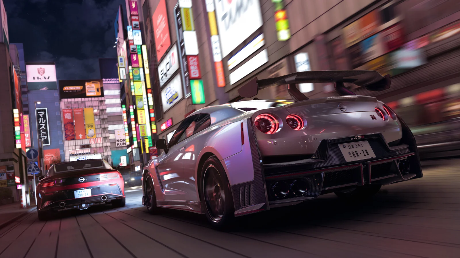 Deux voitures de Forza Horizon 6 lancées dans une rue de Tokyo illuminée de néons la nuit