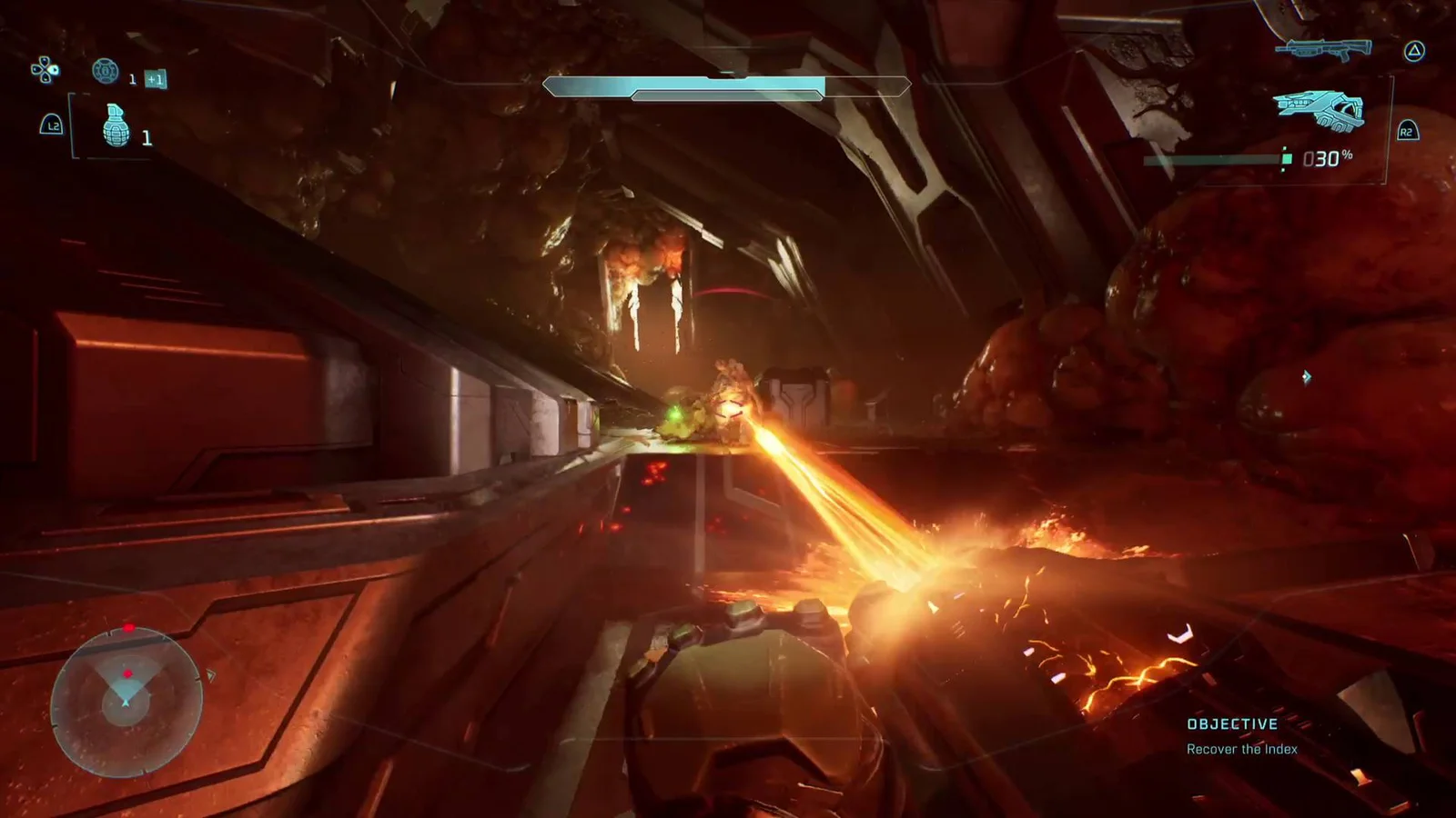Combat contre les Floods dans Halo: Campaign Evolved, avec les boutons PlayStation affichés à l'écran