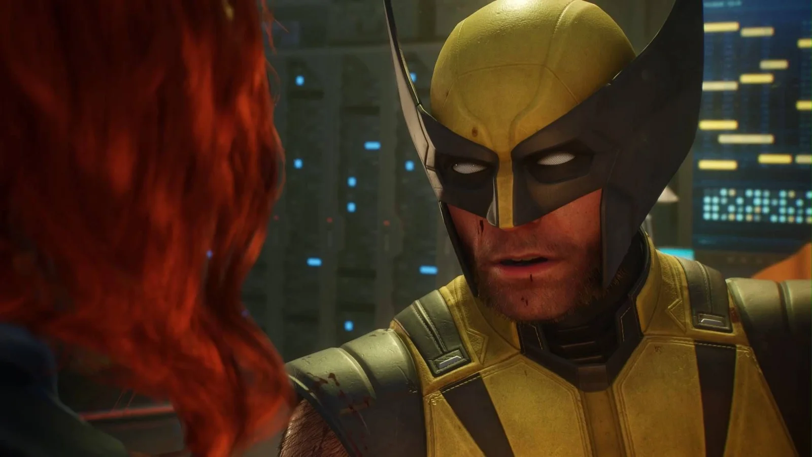 Logan en costume jaune face à Jean Grey dans une séquence cinématique de Marvel's Wolverine.